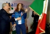 Il Presidente Ciampi consegna la Bandiera alla pi&#249; giovane atleta italiana, Carolina Kostner, al Villaggio Olimpico.