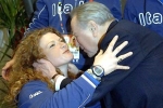 Il bacio ad una Atleta del Presidente della Repubblica Carlo Azeglio Ciampi al termine della colazione al Villaggio Olimpico