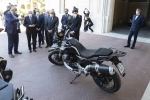 Il Presidente Sergio Mattarella durante la consegna delle moto Guzzi V85TT al reggimento Corazzieri,in occasione del 100° anniversario di Moto Guzzi
