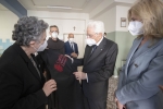 Il Presidente della Repubblica Sergio Mattarella e la Sig.ra Laura nel corso della visita alla mensa della Caritas di Parma 
