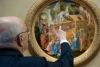 Il Presidente Giorgio Napolitano nel corso della visita alla National Gallery of Art osserva "L'adorazione dei Magi"